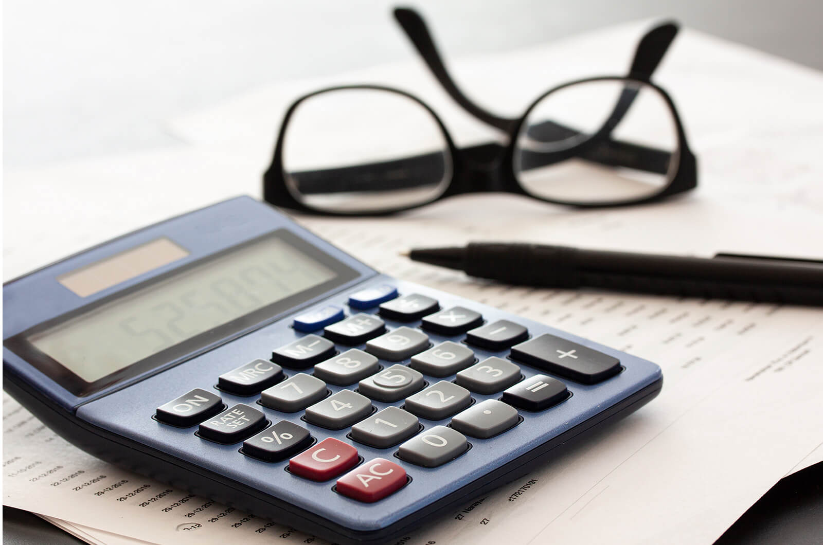 Image of calculator and glasses